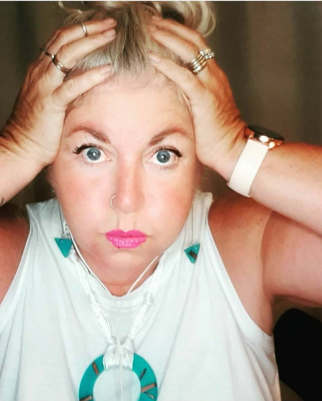 wearing blue resin earrings and necklace at NYFW 2021