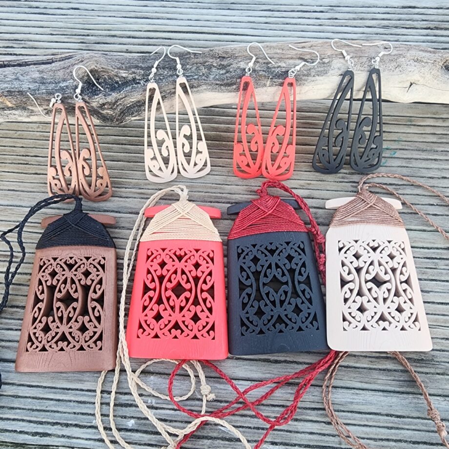 the colour selection of toki necklaces and earrings at the beach