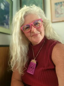 2026_10_05_purple_toki_03 sonia wearing a custom colour magenta purple toki necklace