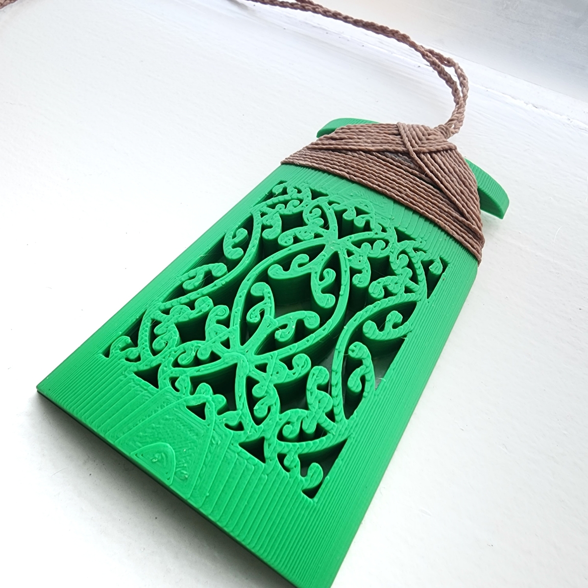 Green toki necklace front image on white background